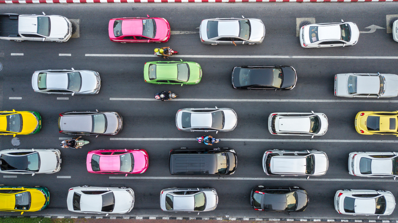 drone shot of several cars